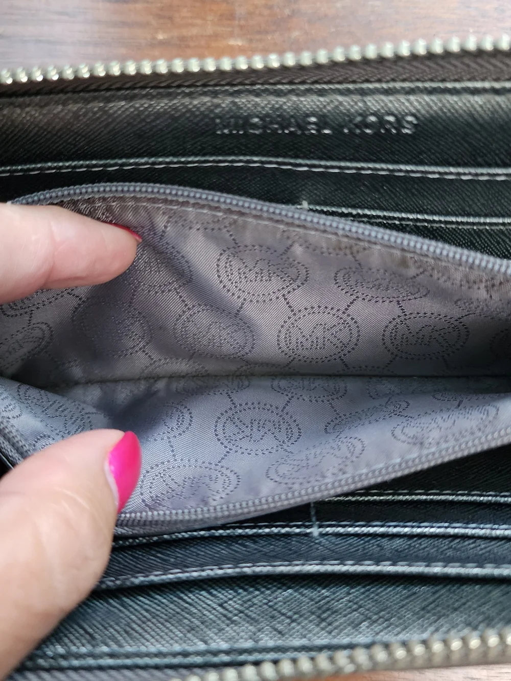 Michael Kors Metallic Pewter Monogram Embossed Zip Around Wallet
